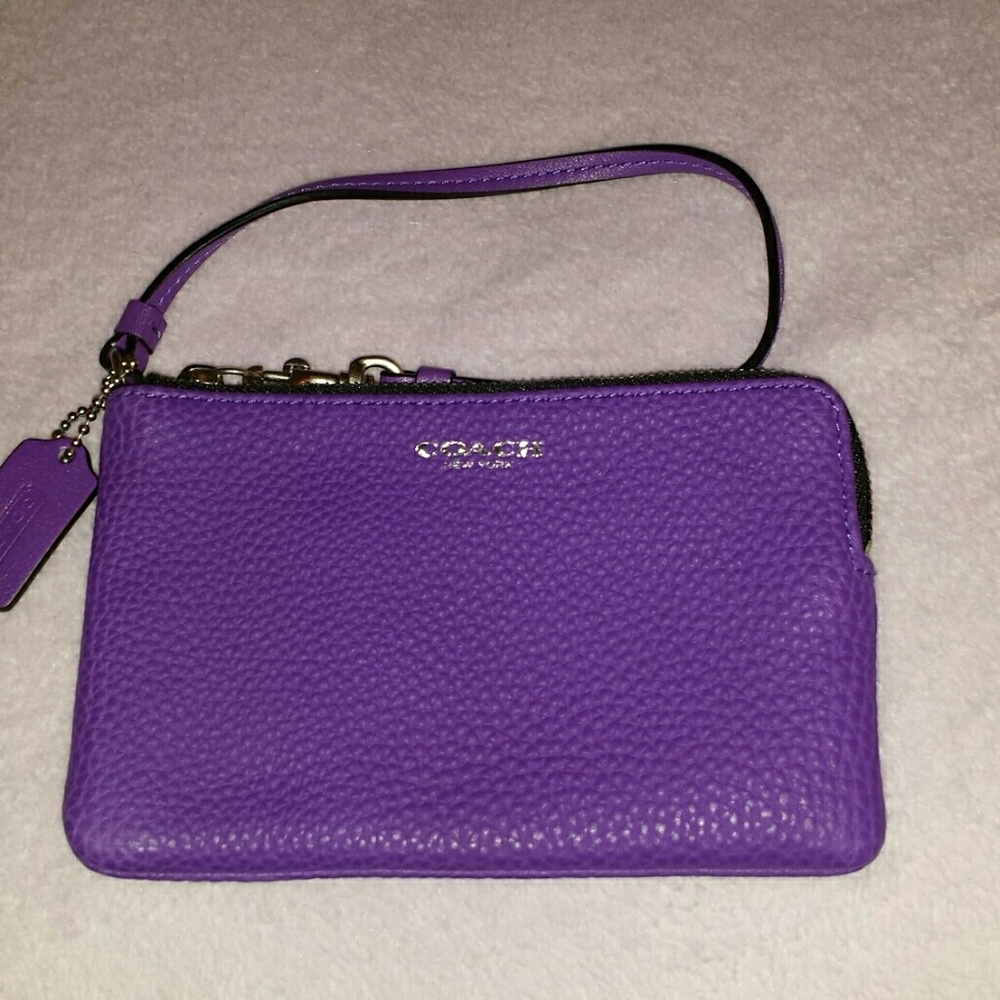 Coach purple pebbled leather wristlet/wallet